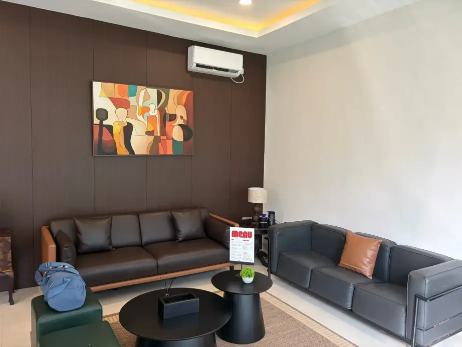 Air-conditioned lounge with leather sofas
